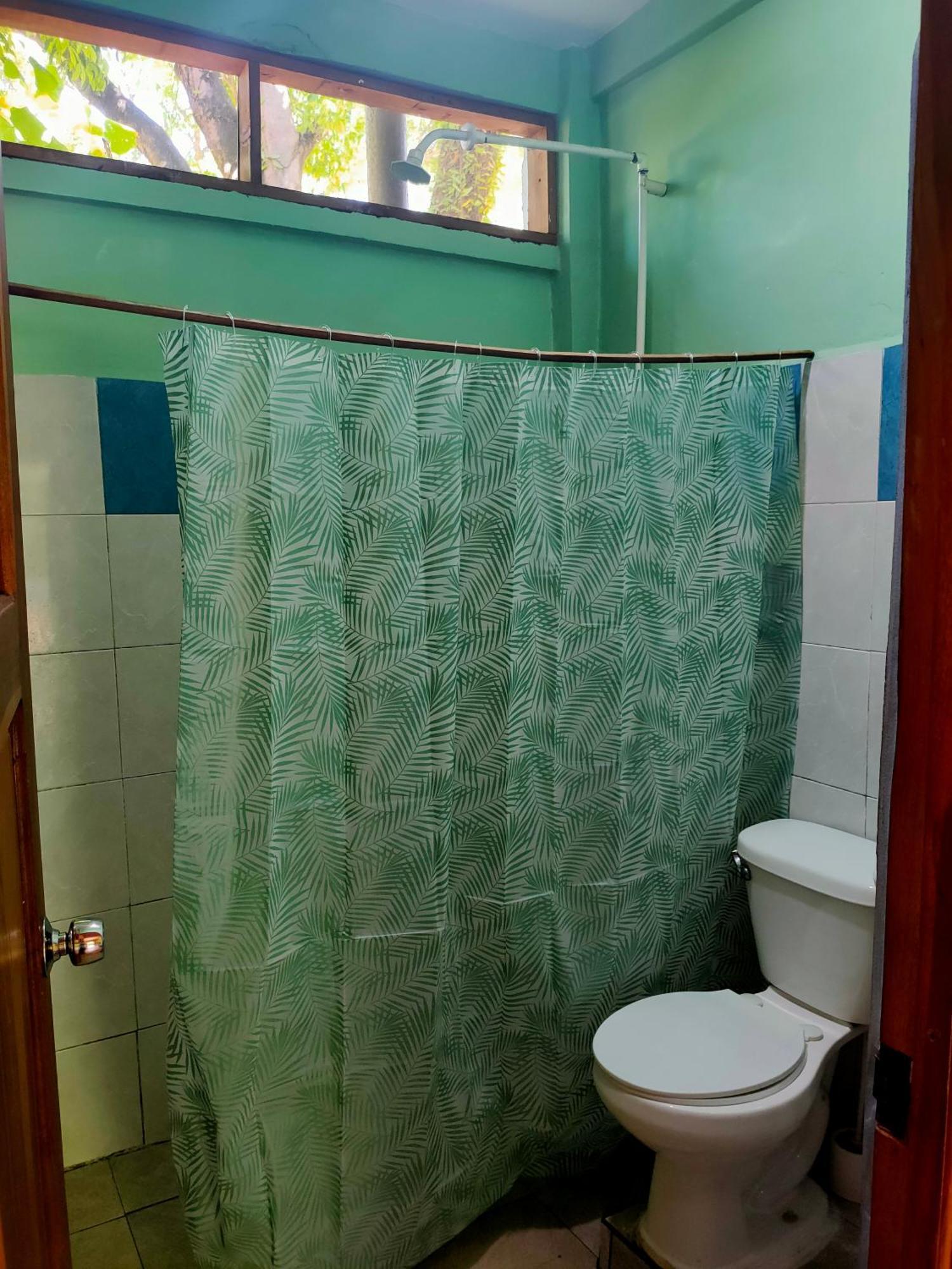 Guesthouse Island Escape South End Стая снимка